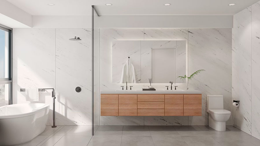 A modern bathroom with a floating vanity and soaker tub